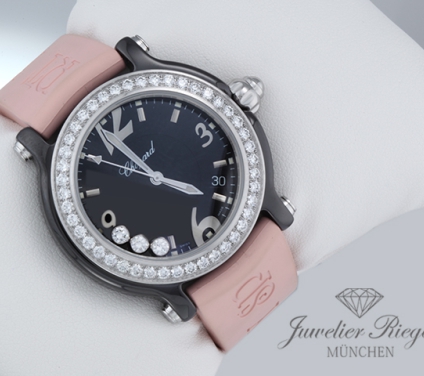Uhransicht von vorne, hauptsächlich das Zifferblatt und die Lünette sichtbar. Chopard Happy Sport Limited Edition schwarze Keramik 288507 Diamanten Diamonds Chopard-Service: Juli 2026