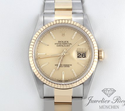 Uhransicht von vorne, hauptsächlich das Zifferblatt und die Lünette sichtbar. Rolex Datejust 36 mm 16233 1998 Stahl Gelbgold 750 Automatik Rolex-Service 2025