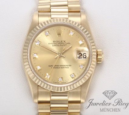 Uhransicht von vorne, hauptsächlich das Zifferblatt und die Lünette sichtbar. Rolex Medium Datejust 31 mm Gelbgold 750 Diamanten Automatik Gold Damen