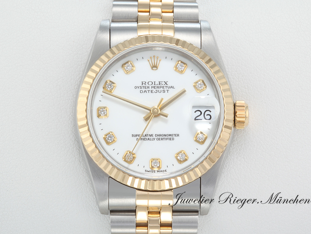 Uhransicht von vorne, hauptsächlich das Zifferblatt und die Lünette sichtbar. Rolex Medium Datejust 31 mm 68273 1995 Stahl Gelbgold 750 Diamanten Automatik