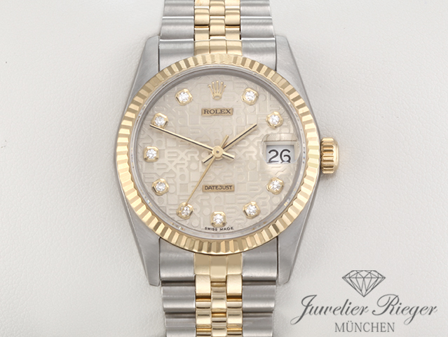 Uhransicht von vorne, hauptsächlich das Zifferblatt und die Lünette sichtbar. Rolex Medium Datejust Stahl Gelbgold 750 1997 Diamanten Automatik Gold Stahl